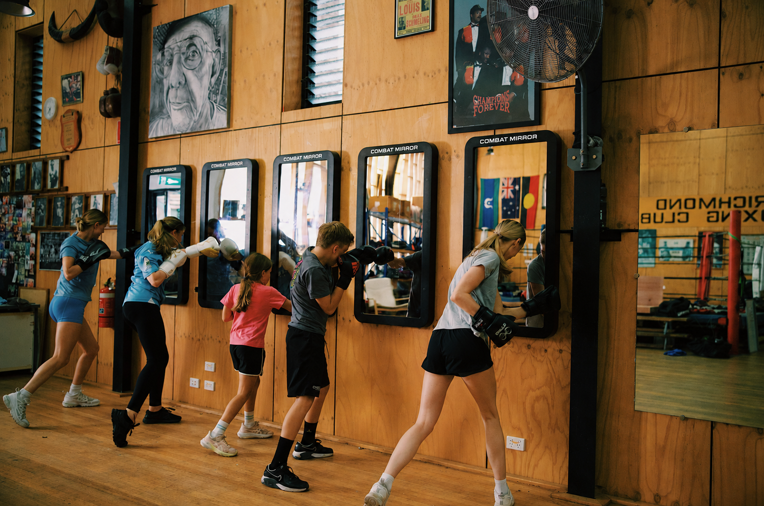 Athletes training on the COMBAT MIRROR™ at Richmond Boxing Club